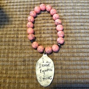 Stretchy charmed bracelet